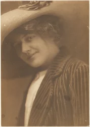 Portrait of a Woman in Striped Blazer