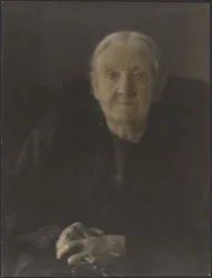 Portrait of a Woman with Hands Folded