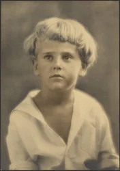 Portrait of a Young Boy in White Shirt
