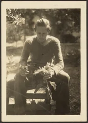 Woman Holding Sunflowers