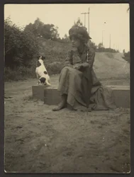 [Woman Seated with Dog]