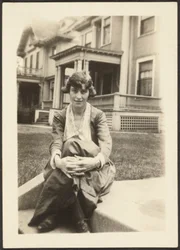 Woman Sitting on a Step