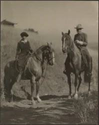 [Woman and Man on Horseback]