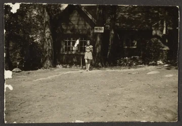 Woman before Cabin