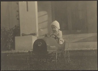 Young Child in Super Six Car