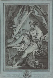 Young Woman Seated on a Bed