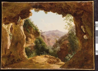A Cave in a Rocky Landscape