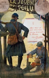 Two French soldiers going through care packets sent from home