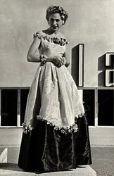 Model in ball gown created by the couture house Graldi