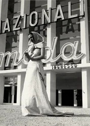 Model in wedding gown created by the couture house 