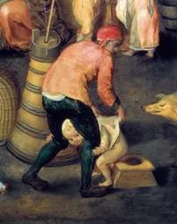 Flemish house interior: A man holds a little boy on the pot