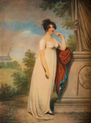 Mary Anne Clarke at the base of a statue