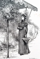 A woman buying holly to use for Christmas decorations