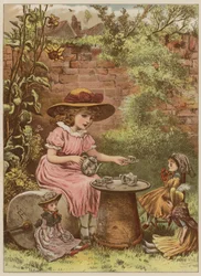 Girl serving tea to her dolls