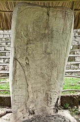 Stela 9 depicting Ajb’alun Haab’tal Wat’ul K’atel, Terminal Classic King from Seibal, Guatemala, commemorating the end of the 9th Katun in AD 849