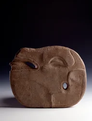 Precolombian art, Mayan civilization, classical period: zoomorphic axe in carved stone representing the head of a deer