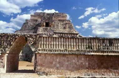 The House of the Birds with The Pyramid of the Magician behind, Late Classic Maya, c.700-900 AD
