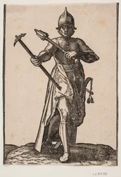 Standing Helmeted Soldier, Front View; in Right Hand a War Hammer, in Left Hand a Club, Rear Leg and Foot Twisted in Relation to the Front; at Left Side a Sword