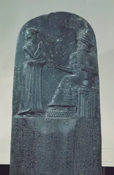 Relief Figure of the Sun God Shamash dictating his laws to King Hammurabi on his Famous Law Code, Old Babylonian Period