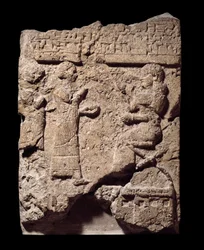 Mesopotamia: limestone relief of scribes taking the loot during the looting of Musasir. from the palace of Sargon II in Khorsabad (Khunsabad). 710 BC. Paris, musee du louvre