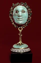 Mexican art: face mask in turquoise paste with diamond eyes. 17th century