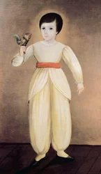 Mexican boy holding cockerel