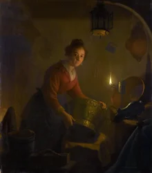 Woman in a Kitchen by Candlelight
