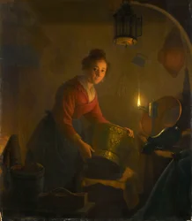 Woman in a Kitchen by Candlelight