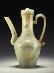 A late Ming celadon jade ewer and cover