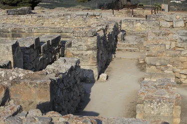 Minoan archaeological site of Phaistos. View over the North East Complex. Complex of four rooms directly adjoining the old palace. These rooms were used to store valuable ritual vessels. The famous Phaistos disc bearing hieroglyphic writing was found here.
