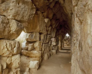 Mycenaean Art: Covered Passage of the Mycenaean Citadel, Tiryns City, around 1200 BC. Greece