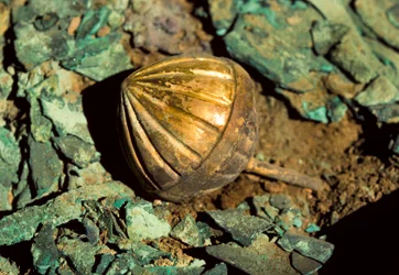 Gold rattle buried in the Moche royal tomb of the Old Lord of Sipan in Peru