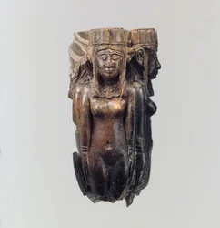Fan or fly-whisk handle in the form of four female figures, c.8th-7th century B.C. (ivory)