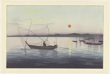 Fishing boats at sunset