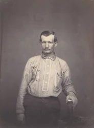 Man Holding Patent Office Book
