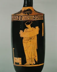 Domestic scene, woman reading