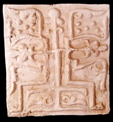 Paleochristian Art: Stone Adorned with Reliefs of Vine Branches and a Cross