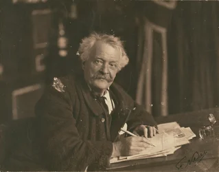 Félix Nadar Seated at Writing Table