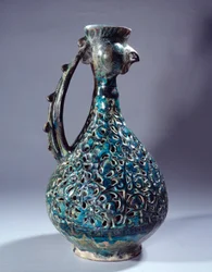 Persian Art: Ceramic Aquamarine with Rooster Head and Decorations Inspired by the Waq Waq Tree. From Kashan. 13th Century Paris, Louvre Museum