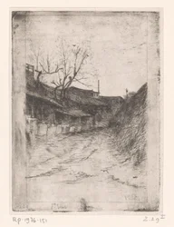 Road Along Buildings and Trees