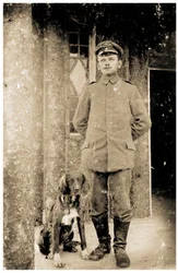 German Army Feldwebel (Sergeant) with a dog