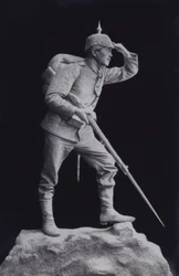 Sculpture of a First World War German soldier looking across the battlefield