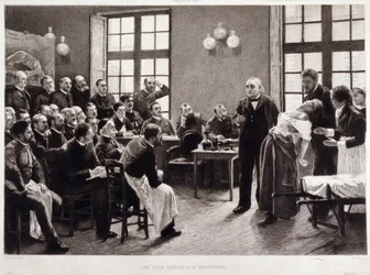 A clinical lecture by Dr. Charcot at the Salpêtrière in 1887. Students from the department of Professor Jean Martin Charcot, who explains the case of Blanche Wittman, his patient and preferred guinea pig for his research on hysteria. He was an assistant