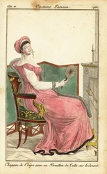 Woman sitting on an Empire chair in a parlour, Paris
