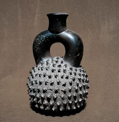 Precolombian art, cupisnic civilization: vase in the shape of a beetle and pomegranate. 300 BC-100 AD