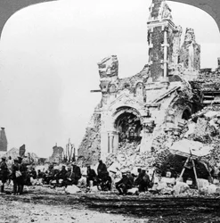 German prisoners of war beside the ruins of the basilica of Albert, France, World War I, 1914-1918