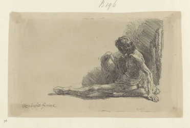 Young Man Sitting on the Ground with One Leg Outstretched