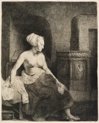 Woman Sitting Half-Dressed Beside a Stove