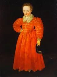Portrait of a Little Boy, standing full length wearing a Red Dress within a White Lace Collar, holding a Black Hat