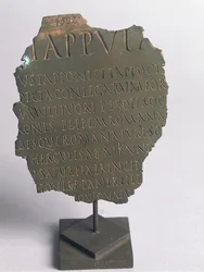 Lex Tappula, fragment of satirical law drawn up by convivial circle from Vercelli, parody written in same form as Roman plebiscite laws, forming part of leges conviviales which were handed down by Festo, bronze, Roman civilization